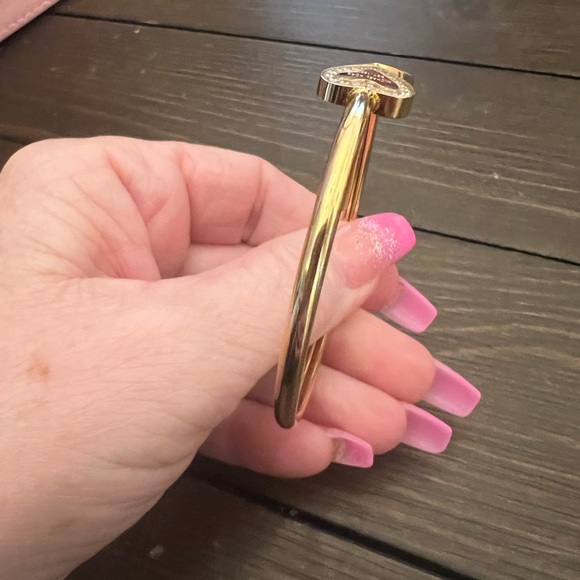 GOLD STAINLESS STEEL ADJUSTABLE BANGLE ACCENTED WITH HEART AND CRYSTALS - Picture 2 of 6